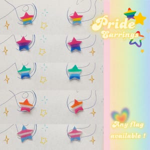 May include: Star-shaped Pride earrings in various flag designs, including bisexual, transgender, and rainbow flags. The earrings are displayed on a white background with the text "Pride Earrings" and "Any flag available!"