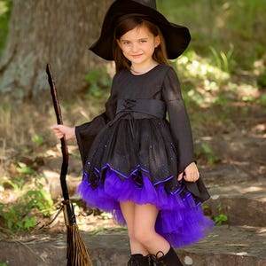 elphaba black dress Transform into Elphaba, with this and purple ruffled with lace sleeves, a printed velvet cape and matching textured hat. Order now, link in bio 1 x Womens Skirt Women Elphaba Costume with Witch