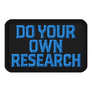 May include: Black rectangular patch with the embroidered text "DO YOUR OWN RESEARCH" in blue. The patch has a black border and the text is in a bold, sans-serif font.