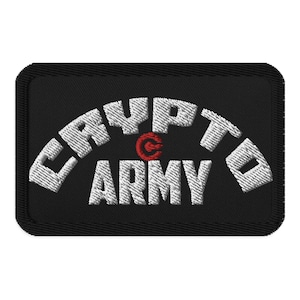 May include: A black embroidered patch with white text that reads "CRYPTO ARMY" in an arc shape. A red "C" is centered above the word "ARMY".