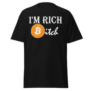 May include: Black t-shirt with the text "I'm Rich Bitch" in white letters. A yellow Bitcoin symbol is next to the text.