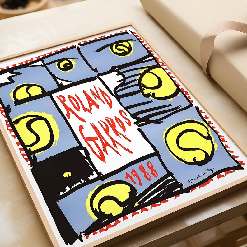 May include: A framed poster with a colorful abstract design featuring tennis rackets and the words "Roland Garros 1988".