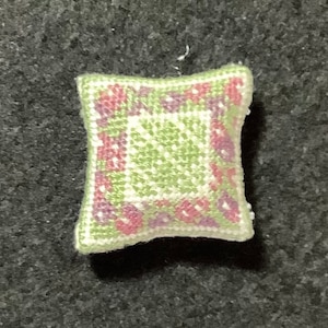 Dollhouse Miniature Needlepoint - Square Pillow with Green Diamond Pattern and Burgundy and Plum Floral Border on Green