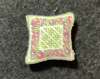 Dollhouse Miniature Needlepoint - Square Pillow with Green Diamond Pattern and Burgundy and Plum Floral Border on Green