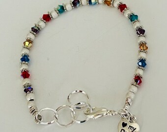 Dog Lover adjustable beaded bracelet to celebrate our cuddly and sweet canines, made with Swarovski Crystals and silver plated Pewter.