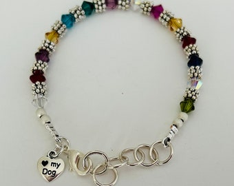 Love My Dog Charm Swarovski Crystal adjustable womens beaded bracelet can be worn alone or as an accent piece. Can be personalized