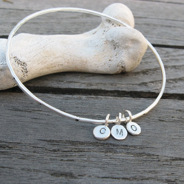 Personalized sterling silver bangle hammered and dotted with 3 custom initial tags by VisionQuest