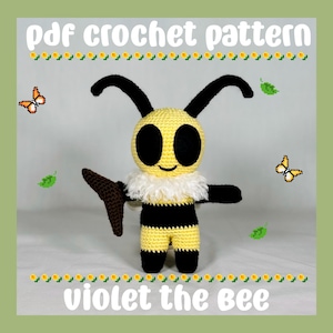 May include: Crochet pattern for Violet the Bee, a cute crocheted bee toy with black eyes, a yellow and black striped body, and brown wings. The pattern includes instructions for crocheting the bee and its accessories.