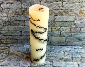 Ants marching along, tall and thin, real wax LED candle, repurposed LED candle with whimsical ant image on an ivory color candle, 2”x8".