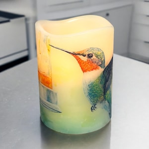 Hummingbird, real wax flameless candle, lovely hummingbird at a feeder, LED candle, 3&quot;x4&quot;.