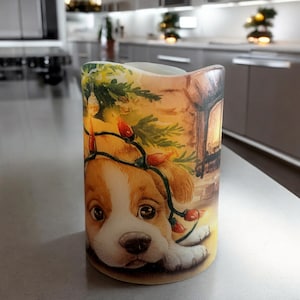 Puppy wrapped in Christmas lights, real wax flameless candle for Christmas and winter, adorable puppy in front of fire place and tree, 3&quot;x4&quot;