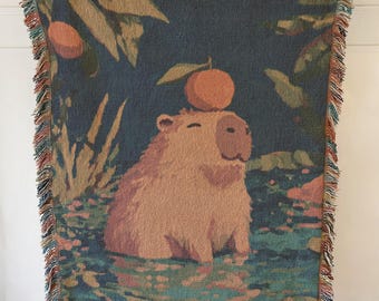 Tapiz de manta tejida de carpincho naranja, tapiz de carpincho, decoración serena para el hogar, manta divertida de carpincho, manta acogedora para amantes de la selva.