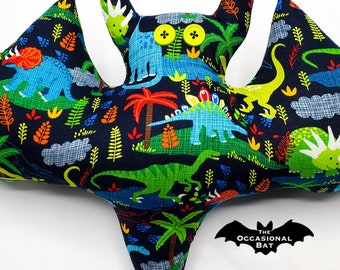 Blue Bat Pillow with Dinosaurs