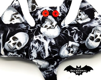 Black and White Bat Pillow with Skulls