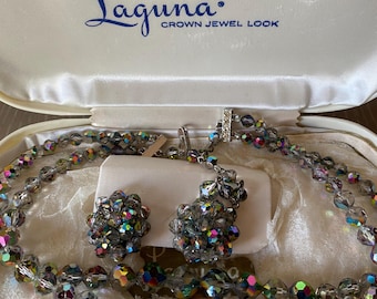 Laguna Smokey aurora borealis double strand necklace and clip on earrings set.  original box included.  in beautiful vintage condition.