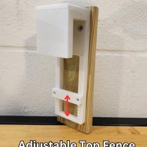 May include: White adjustable top fence beam lip with a wooden post. The lip is adjustable up and down to fit different fence heights.