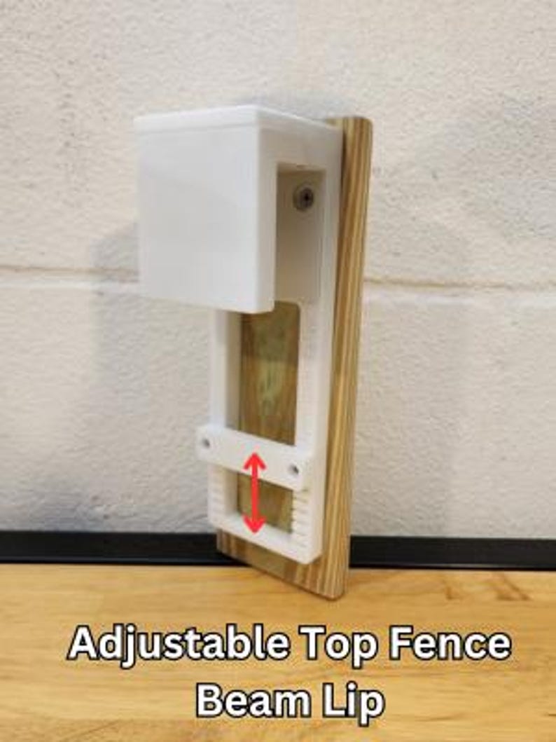 May include: White adjustable top fence beam lip with a wooden post. The lip is adjustable up and down to fit different fence heights.