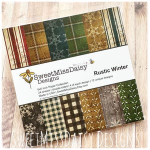 May include: A paper collection titled "Rustic Winter" with various patterns, including snowflakes, plaid, and wood grain. The package is 6x6 inches and contains 24 double-sided sheets with 12 unique designs. The brand name is SweetMissDaisy Designs.