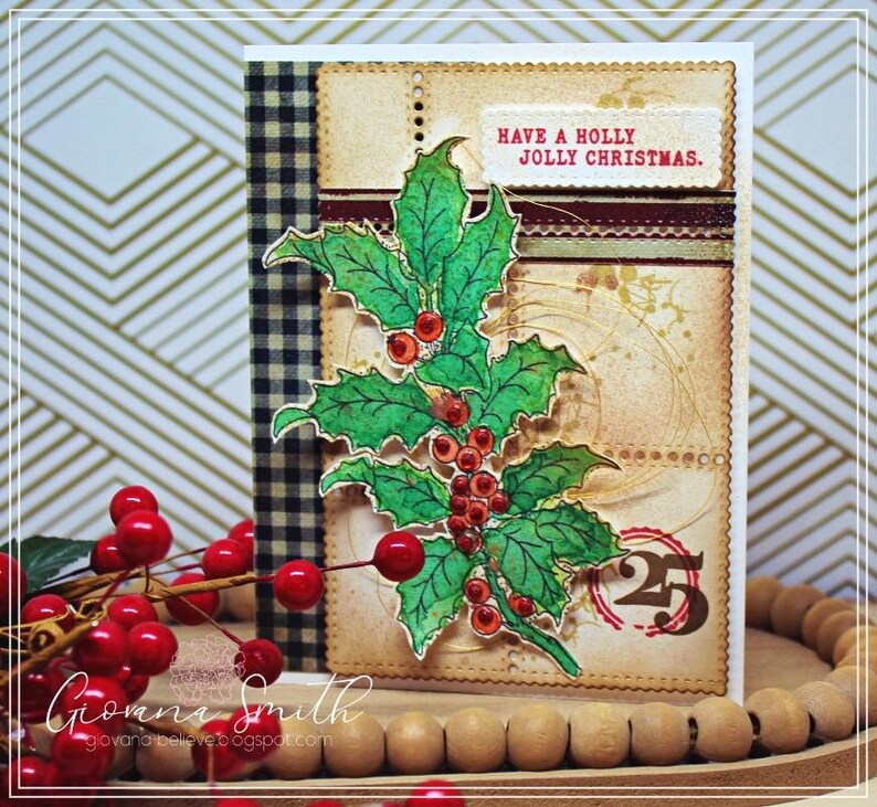 May include: A handmade Christmas card featuring a holly sprig with red berries. The card has a vintage aesthetic with a beige background, a gingham pattern, and the text "Have a Holly Jolly Christmas."