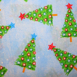 Christmas Tree Fabric With Tumbling Trees Cotton Fabric On A Blue Background Sold By The Yard and Half Yard