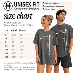 May include: A size chart for Comfort Colors 1717 unisex short sleeve adult t-shirts. The chart lists sizes S through 4XL with corresponding width and length measurements in inches. The image includes a visual guide showing width and length.