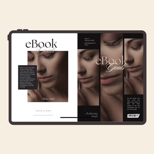 May include: A digital tablet displaying an ebook cover titled "eBook Goals." The cover features a woman's face in a soft, neutral color palette. Additional text includes "Issue 2 February 2023" and "Achieving Goals."