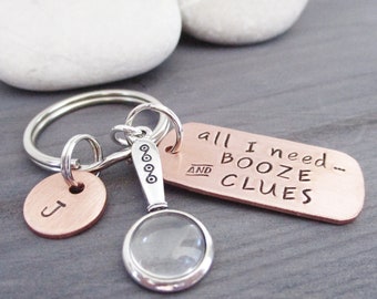 Personalized True Crime humor Keychain, True Crime Lover gift, All I need booze and clues, magnfying glass charm, optional initial disc
