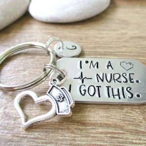 May include: Silver keychain with a heart charm and a tag that reads "I'm a Nurse. I Got This." The tag has a small heart and a heartbeat graphic.