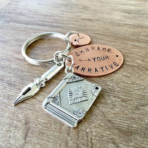 Embrace Your Narrative Keychain Copper with book and pen charms, author gift, novelist gift, journalist gift, writer gift, writer's keychain image 1