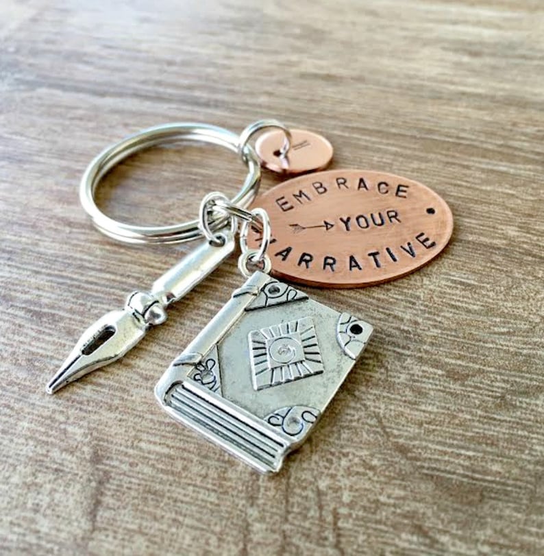 Embrace Your Narrative Keychain Copper with book and pen charms, author gift, novelist gift, journalist gift, writer gift, writer's keychain image 1