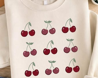 Diseño PNG de sublimación con estampado retro de cerezas, gráfico para camiseta color malva empolvado (descarga digital)