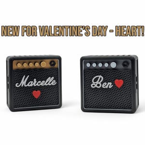 2 guitar pick holders, showcasing new ability to have a heart ❤️ added to your custom item for valentine's day