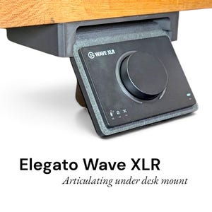May include: A black Elgato Wave XLR audio interface mounted to a dark gray 3D-printed articulating under-desk bracket. The device features a large central control dial, a logo, and small icons for microphone, headphones, and phantom power settings.