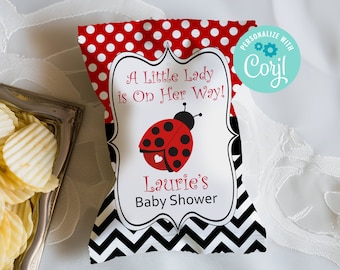 May include: A red and black polka dot treat bag with a white label that says "A Little Lady is On Her Way!" and features a red ladybug with black spots. The label also says "Laurie's Baby Shower".