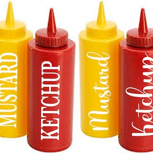 May include: Four squeeze bottles, two yellow and two red, labeled "Mustard" and "Ketchup" in white text. The yellow bottles have yellow caps, and the red bottles have red caps. Ideal for condiments.