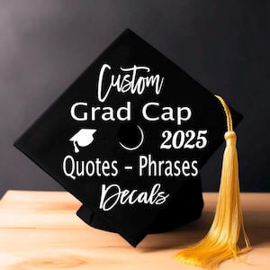 May include: Black graduation cap with a white tassel and white text that reads "Custom Grad Cap 2025 Quotes - Phrases Decals".