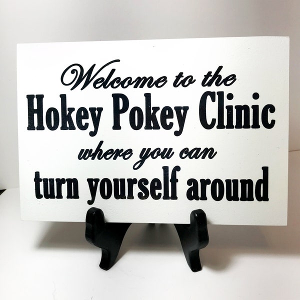 Welcome to the Hokey Pokey Clinic where you can turn yourself around sign wood