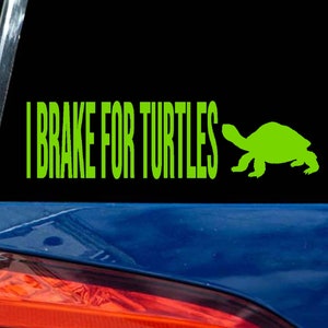 May include: A green vinyl decal with the text "I Brake For Turtles" and a silhouette of a turtle.