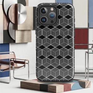 May include: Black and white geometric pattern phone case. The case features a repeating cube design with white lines on a black background. The phone case has a camera cutout and is displayed on a wooden block.