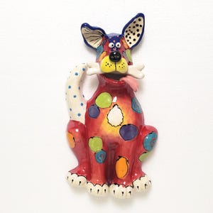Handmade Ceramic Dog Wall Art: Colorful Sitting Dog with Bone