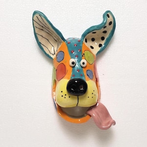 Handmade Ceramic Dog Face Wall Hanging: Turquoise, Orange, Pink Tongue