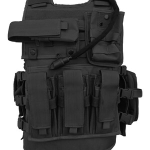 May include: Black tactical vest with multiple pouches, straps, and a hydration system. The vest features various compartments for carrying equipment and is designed for protection and utility. The vest has adjustable straps and buckles for a secure fit.