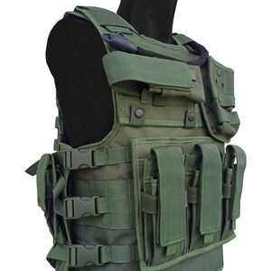 May include: Olive green tactical vest with multiple pouches, straps, and buckles. The vest features various compartments and adjustable straps for a secure fit. It is designed for utility and protection, with a focus on functionality and durability.