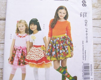 Mc Calls 6066 skirt legging applique sewing pattern sizes 7-8-10-12-14 uncut