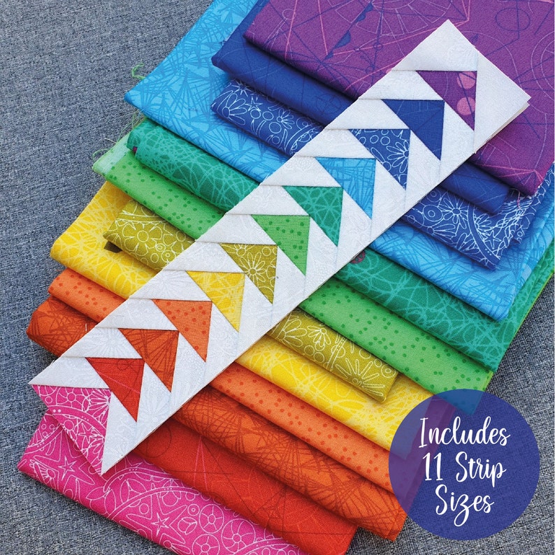 May include: A stack of 11 colorful fabric strips with a white triangle pattern overlayed on top. The fabric strips are arranged in a rainbow pattern. The text "Includes 11 Strip Sizes" is visible in the lower right corner of the image.