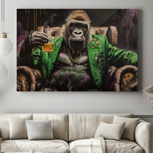 May include: A gorilla wearing a green jacket and a gold chain sits in a leather armchair, holding a glass of amber liquid. The background is a dark, abstract design with splashes of color.