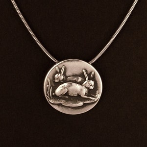 Sterling Silver Two Bunnies Rabbit pendant made from antique vintage button