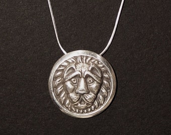 Sterling Lion Face pendant made from vintage button