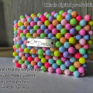 May include: A beaded wallet in a variety of pastel colors, including pink, blue, green, yellow, and purple. The wallet has a metal tag that says "One Direction". The image also includes text that says "This is digital product in PDF" and "Detailed step by step lesson how to make wallet as on a picture in PDF format."