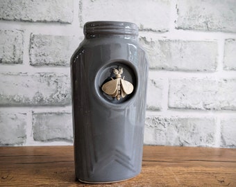 Grey moth  jar